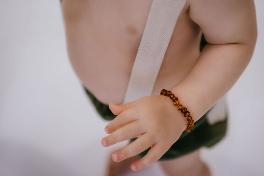 classic amber teething bracelet on baby