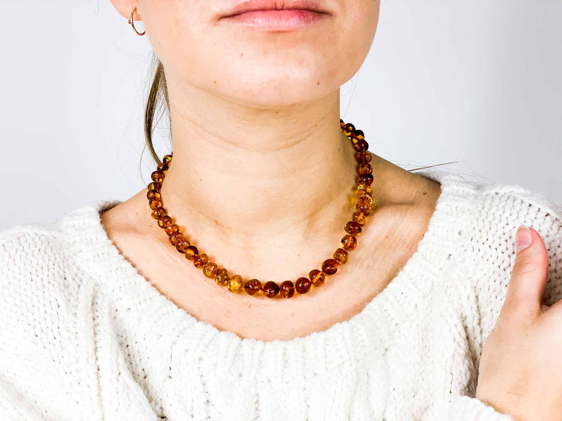 woman with beaded necklace