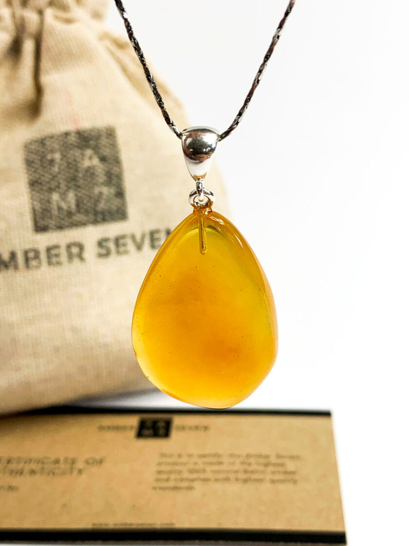 egg yolk color amber teardrop pendant with silver