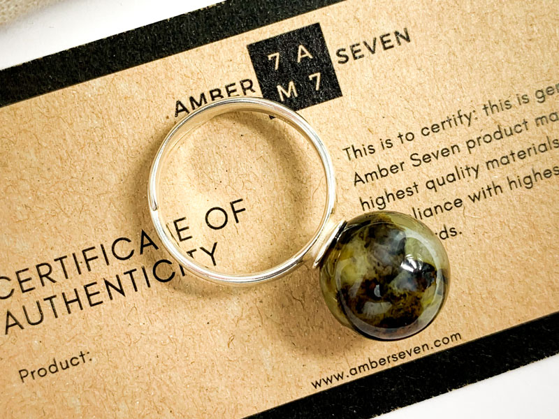 green amber stone ring