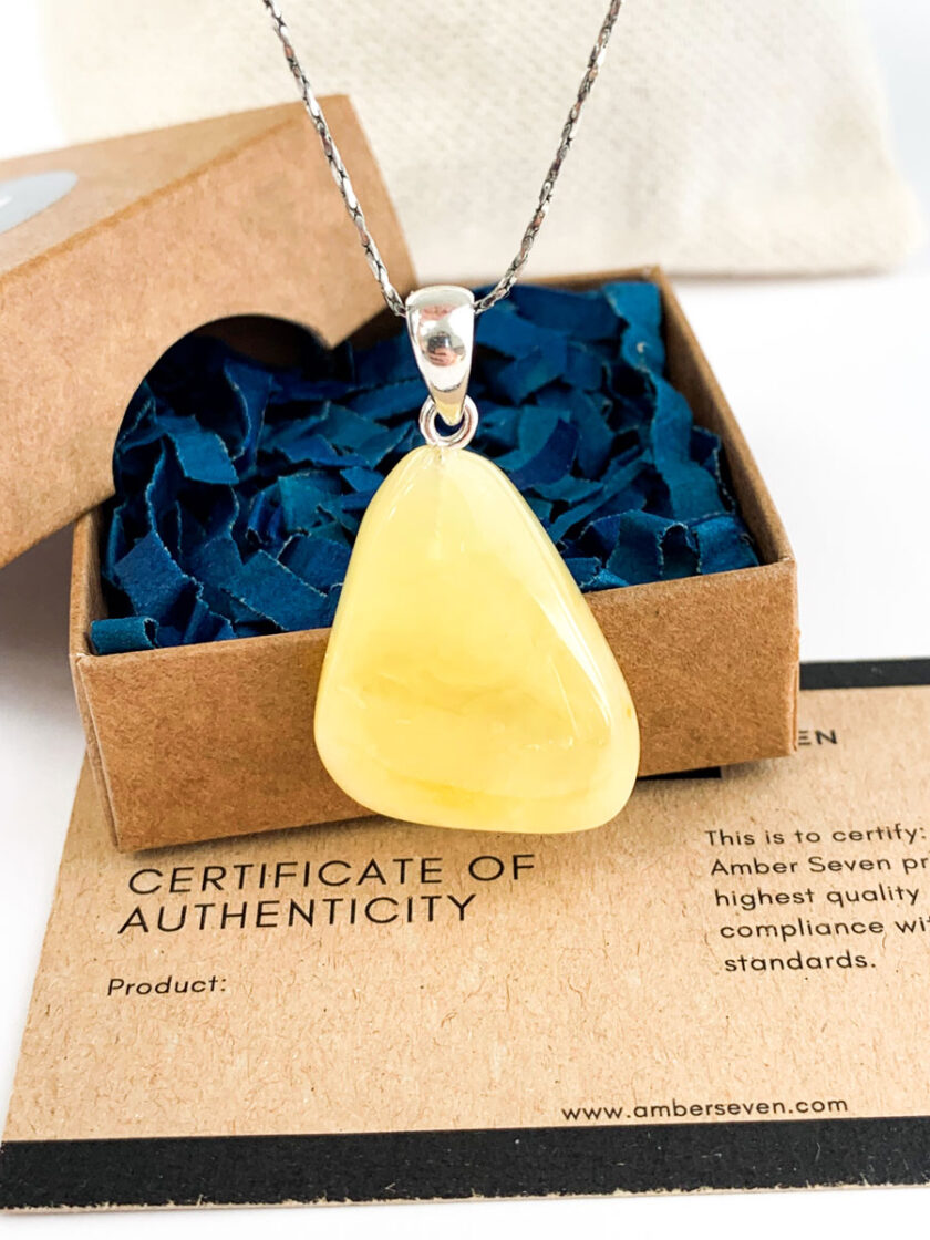 white baltic amber pendant